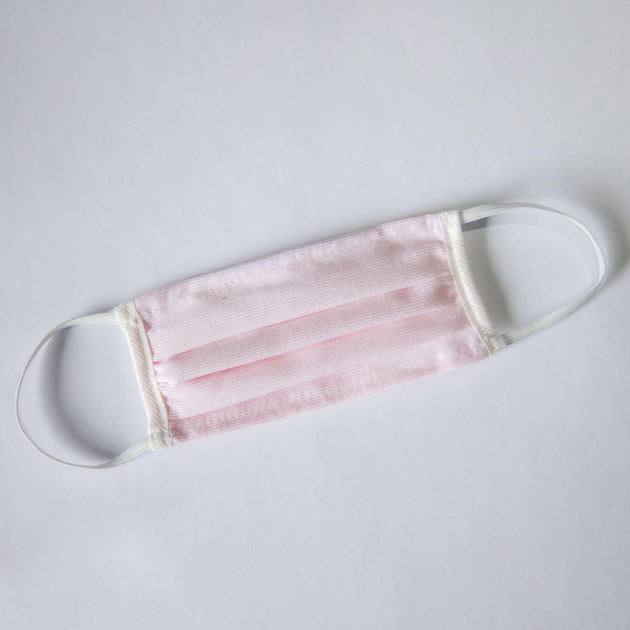 Mund- & Nasenmaske für Kinder mit elastischem Gummiband & eingenähtem Nasenbügel (rosa)